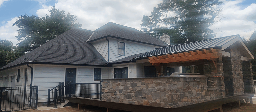 KPI house with shingles and metal roof Ask about our high-quality shingle and metal roofing.