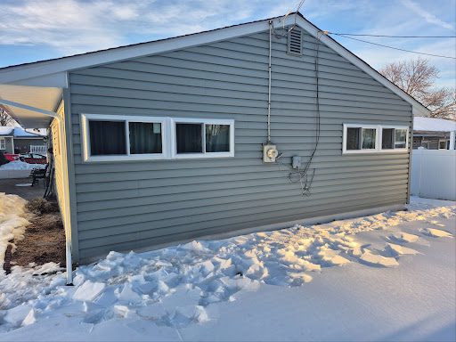 Close-up of new replacement window with sealed trim and clean install on a Levittown, PA home.
