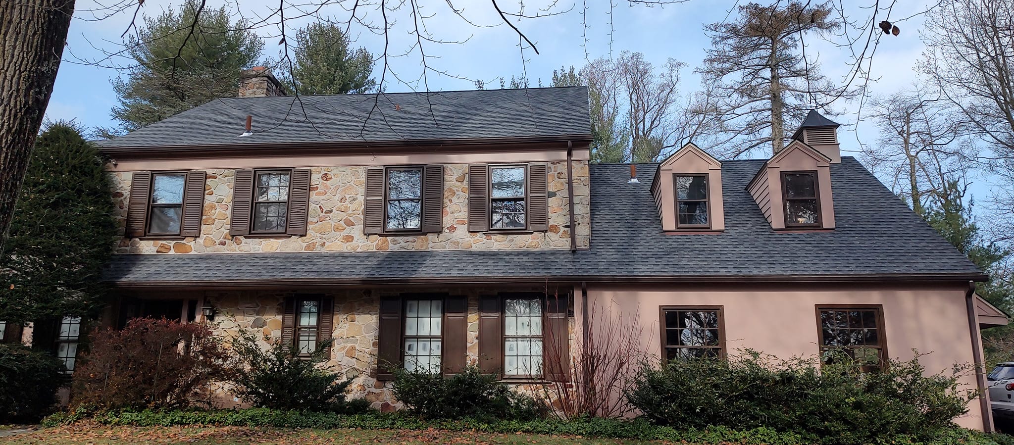 A residential roof showing signs of wear